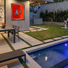 Artwork_by_Bing Hitchcock_title_Proptious_Moment__hanging_on_wall_overlooking_a_private_home_pool